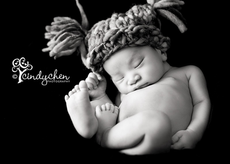 newborn boy with a cute knit hat
