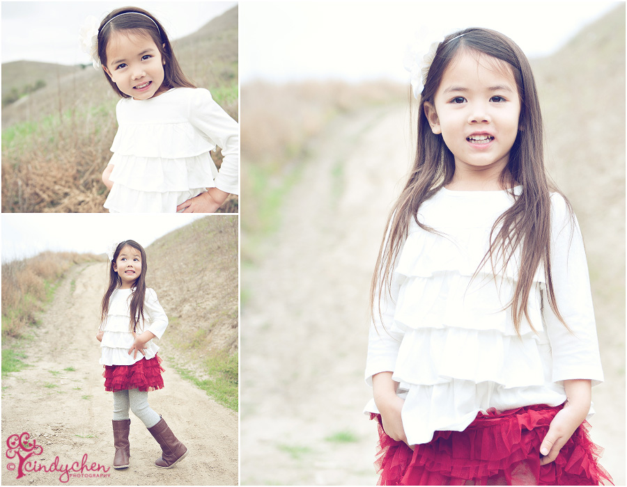 cute four year old girl posing during holiday photo session